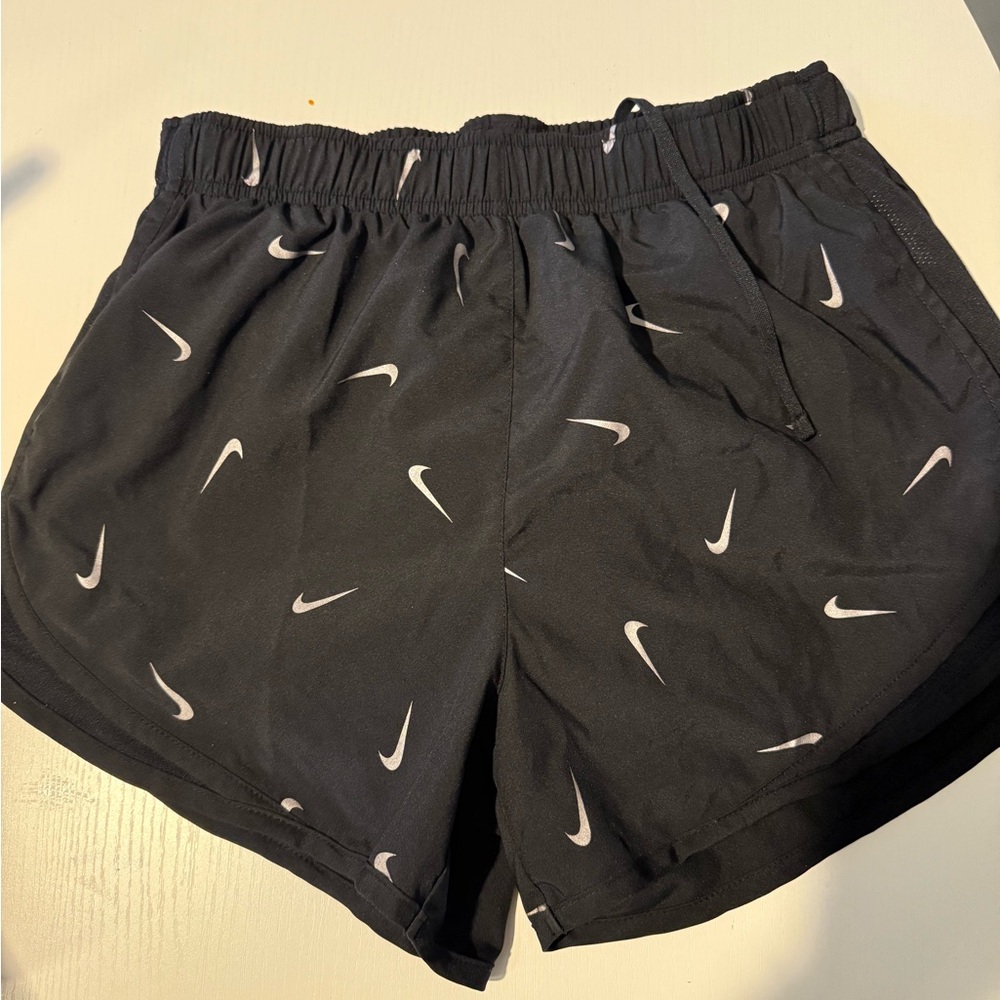 Nike Black Shorts with White Swoosh Design